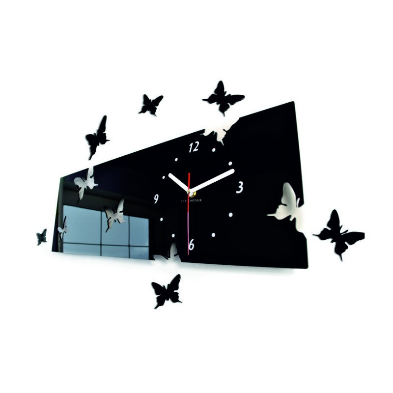 Modern wall clock made of plexiglass. Trendy clock on the wall as a gift. X-momo clocks. PMMA
